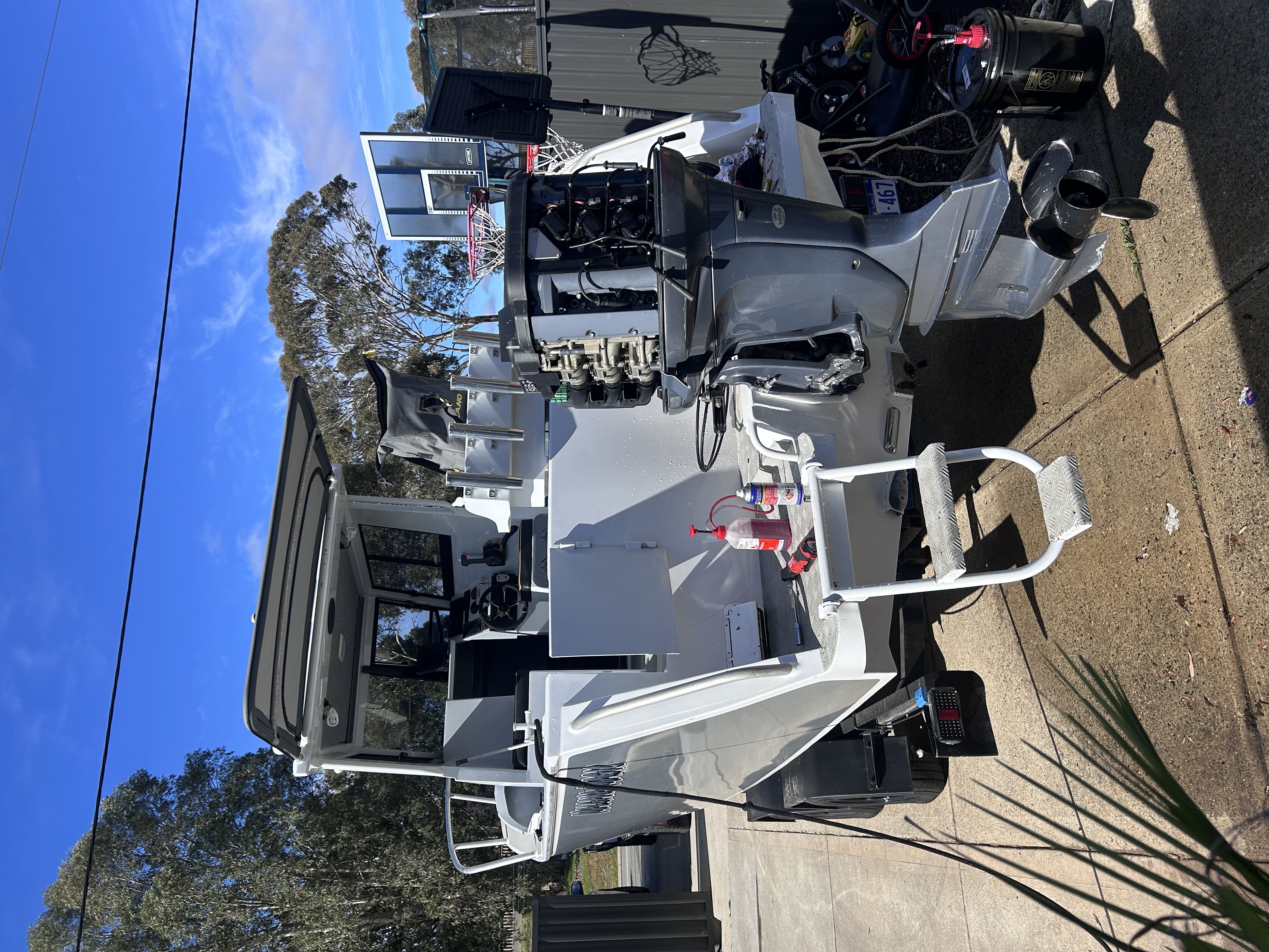 Marine mechanic's tools and engine work on site