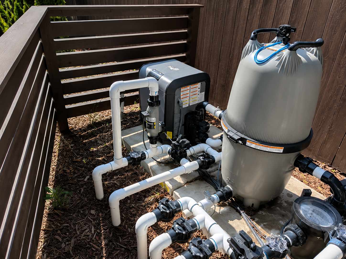 Pool equipment repair technician fixing a pump in Badin NC