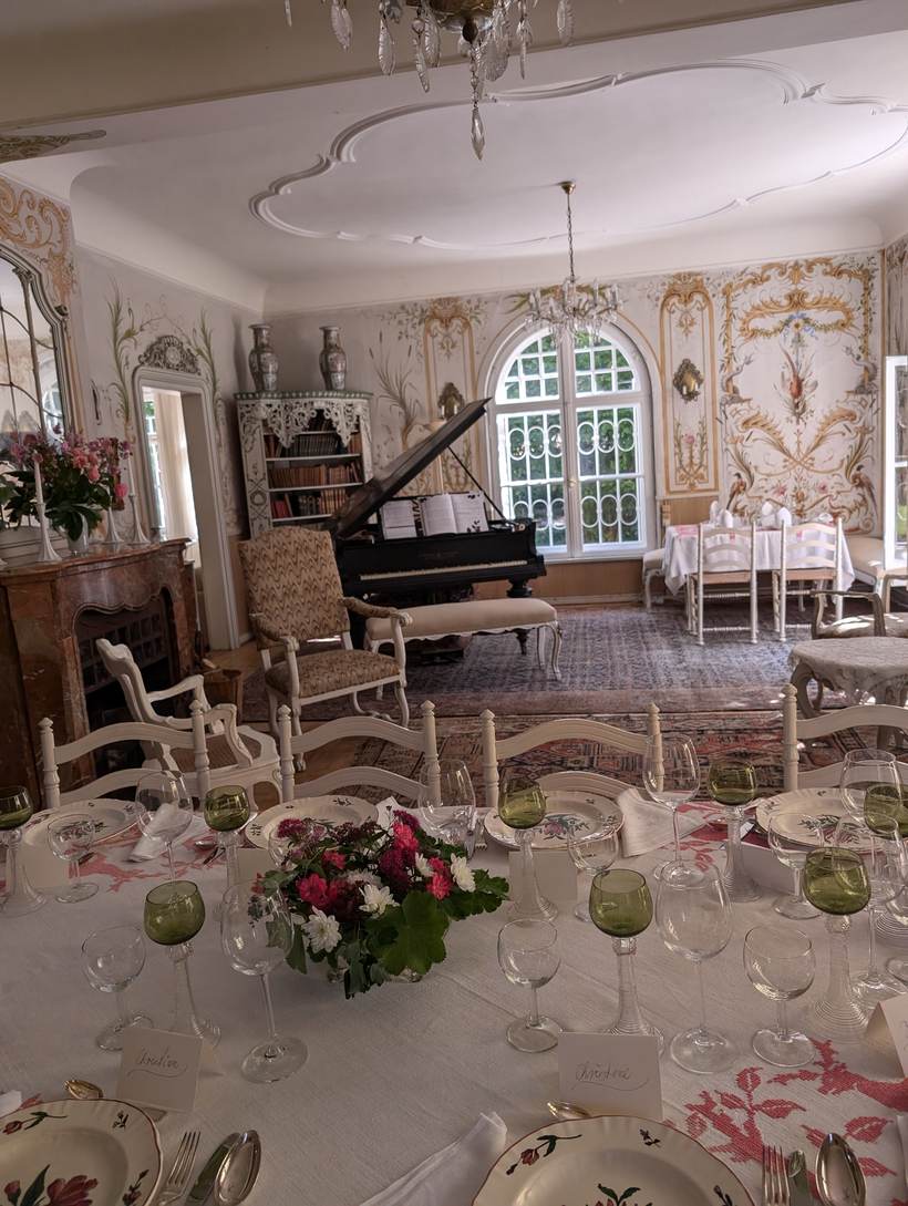The long table with hand-written place cards