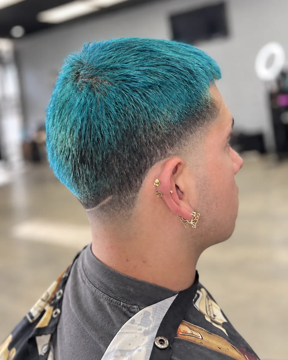 Profile of a modern fade with a textured fringe styled forward