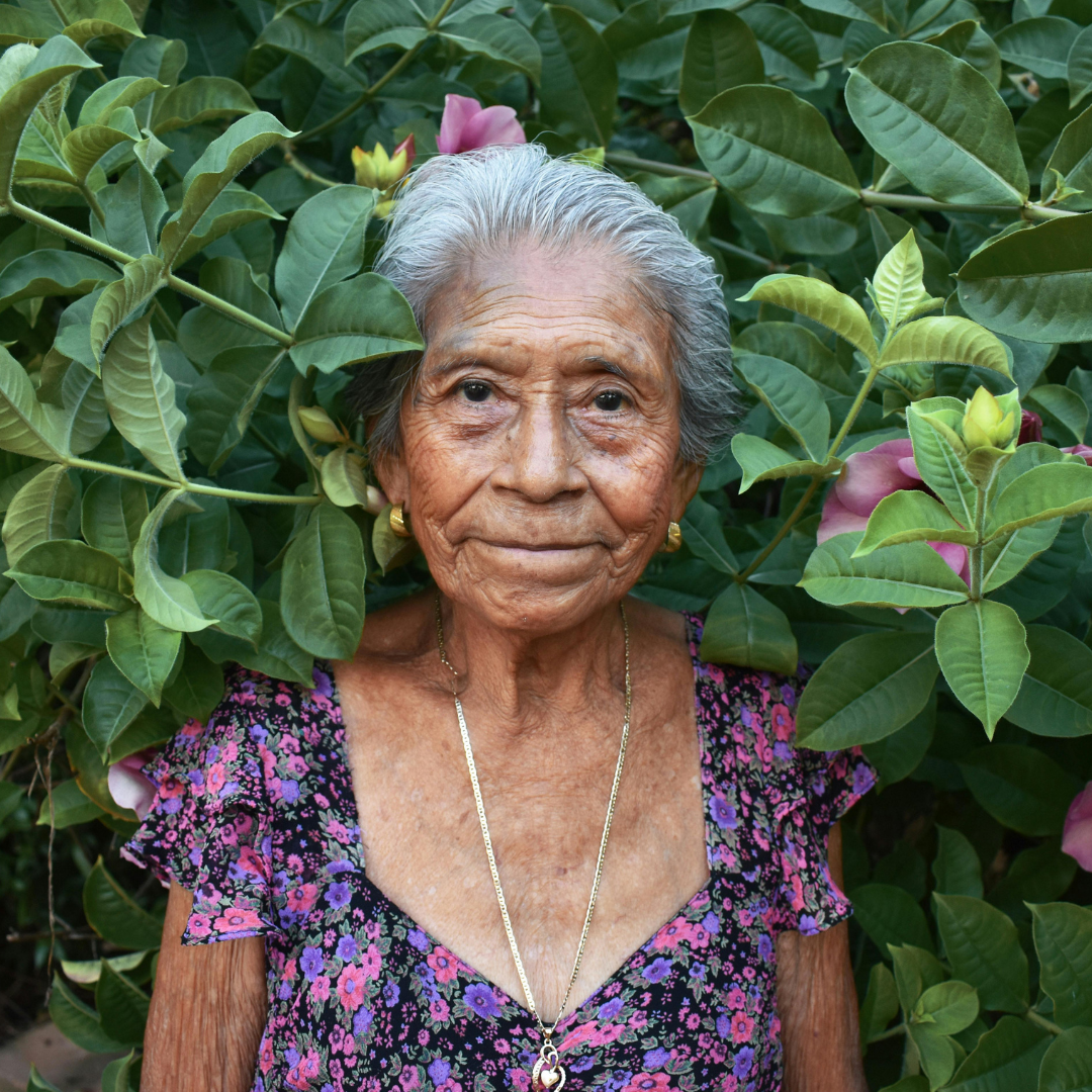 Elderly woman in garden