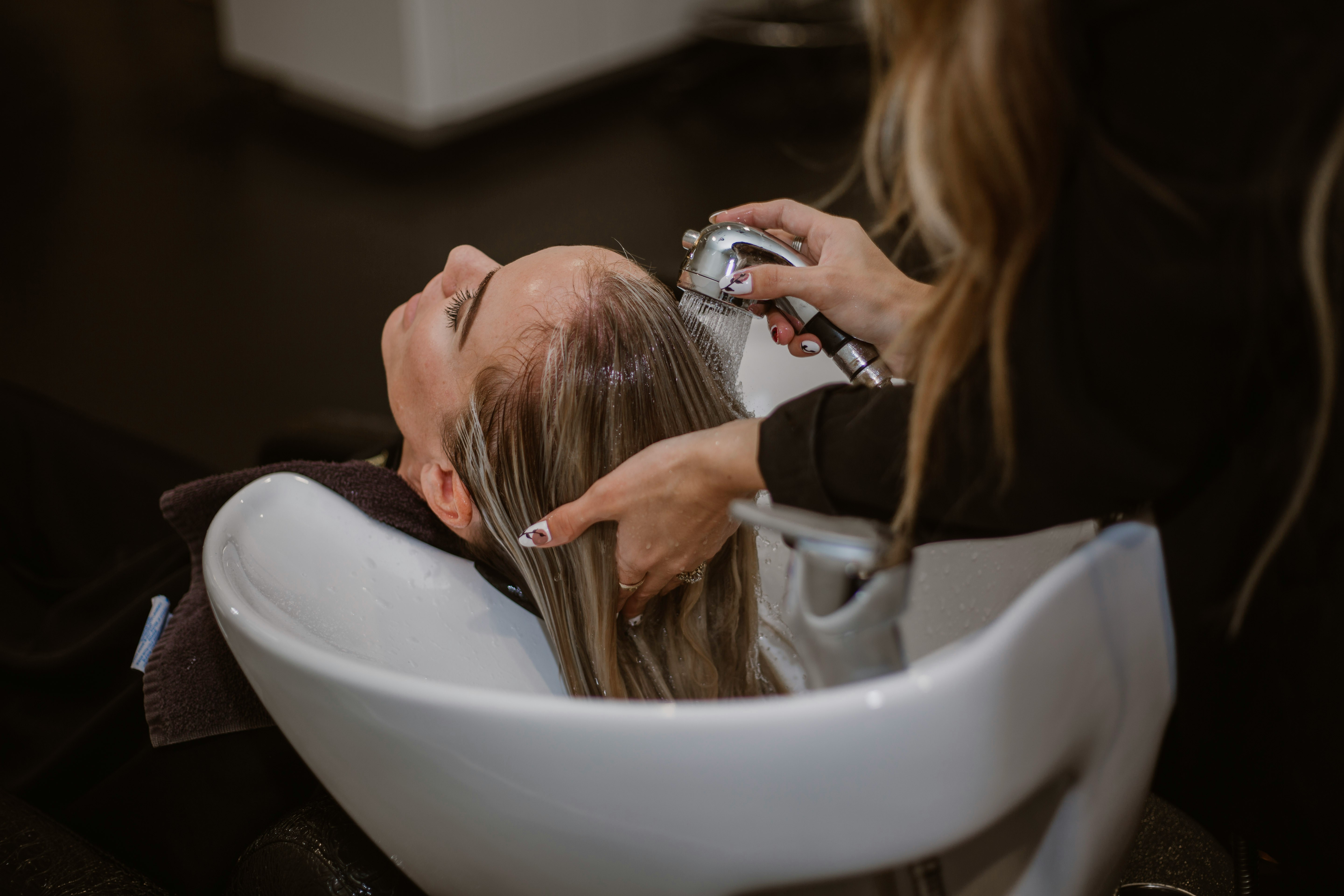 Marbett Beauty Salon interior with stylist at work