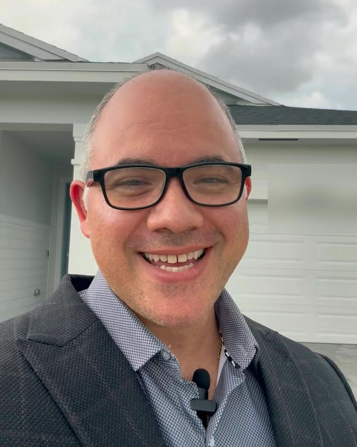 Narayan Ramirez of Realty ONE Group Precision at a new-construction home in Port St. Lucie