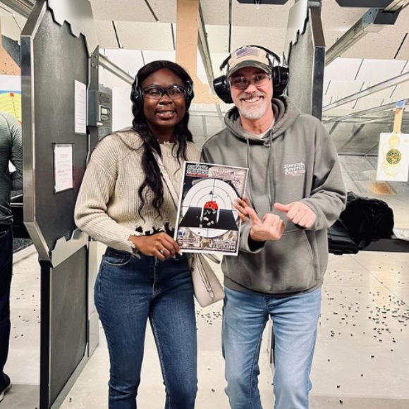 Range Class Students holding Target