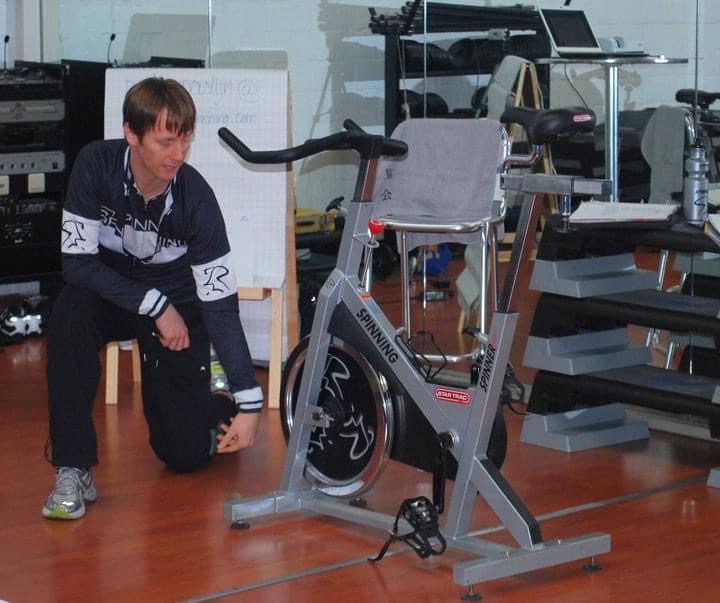 Peter teaching an indoor cycling class in the late 1990s