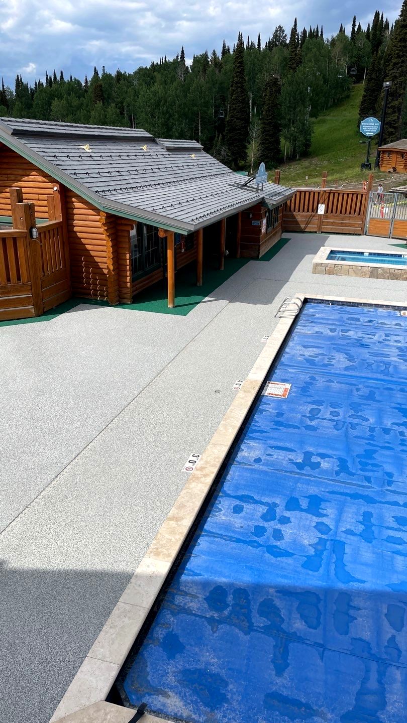 Commercial pool deck coating by Armored Concrete Systems at a mountain lodge