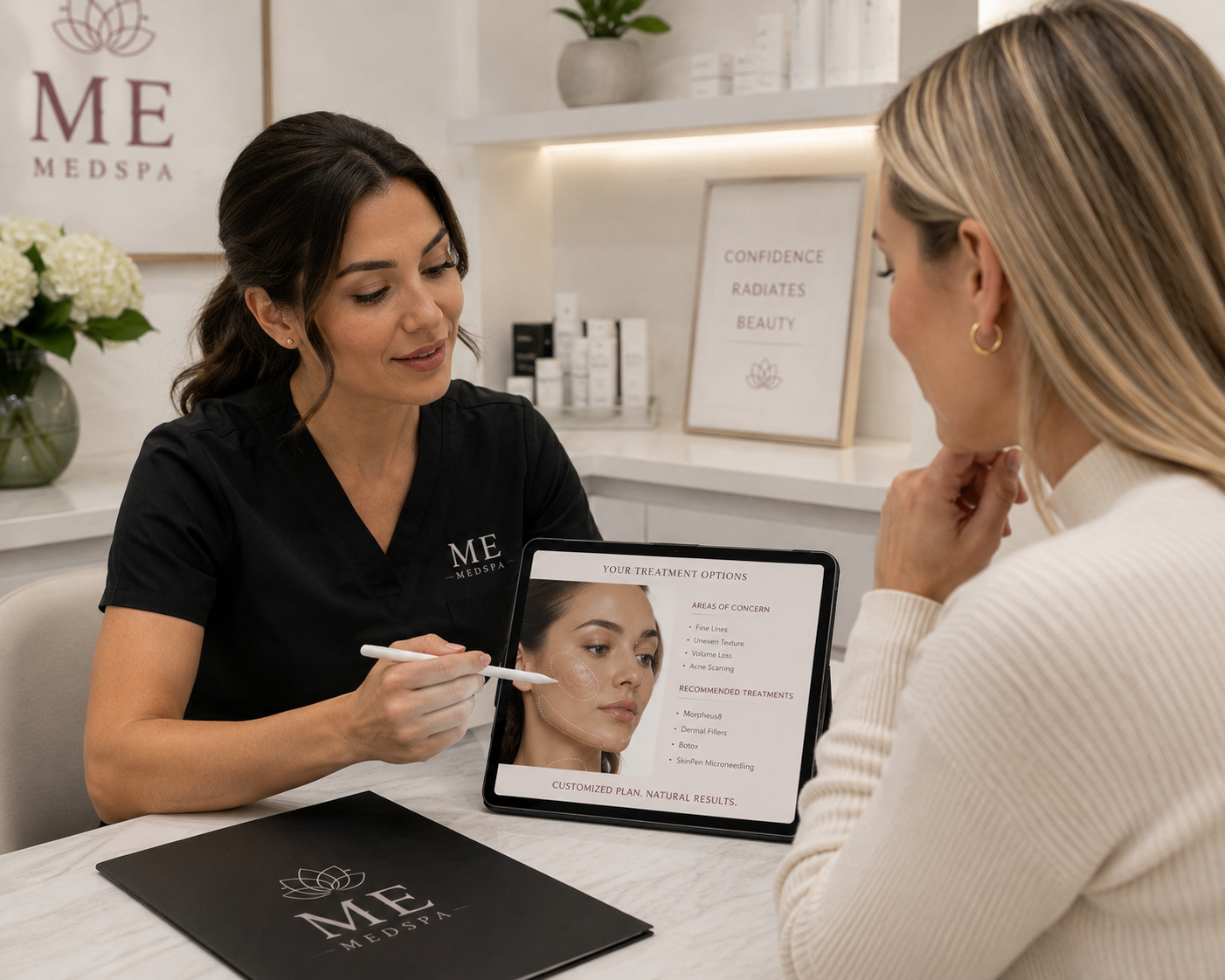 Provider helping a patient choose between microneedling and Morpheus8