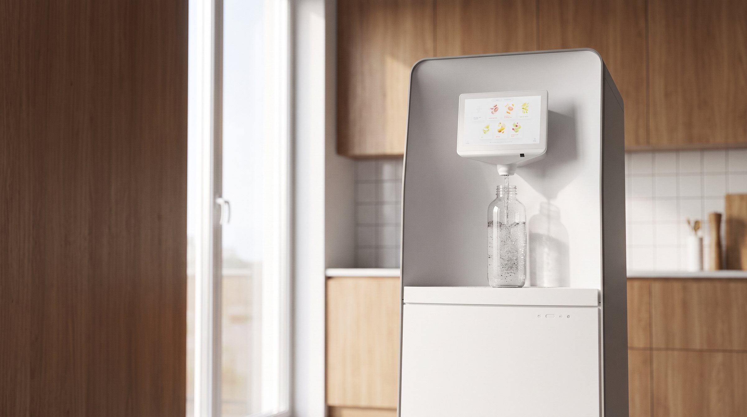 A sparkling water dispenser filling a reusable bottle in a modern office