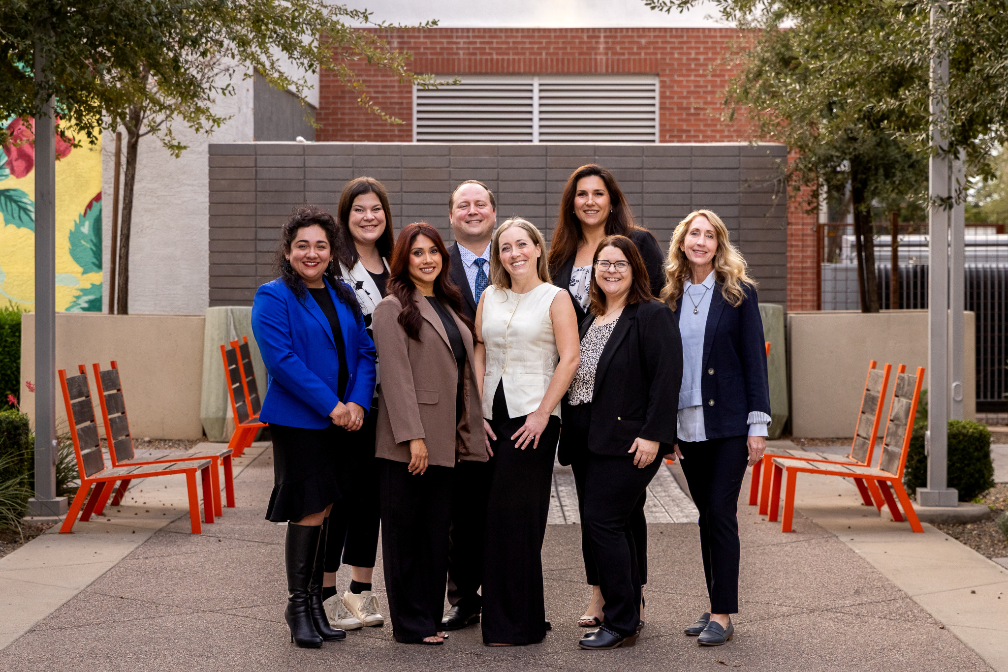 Partners in Leadership participants standing together outdoors