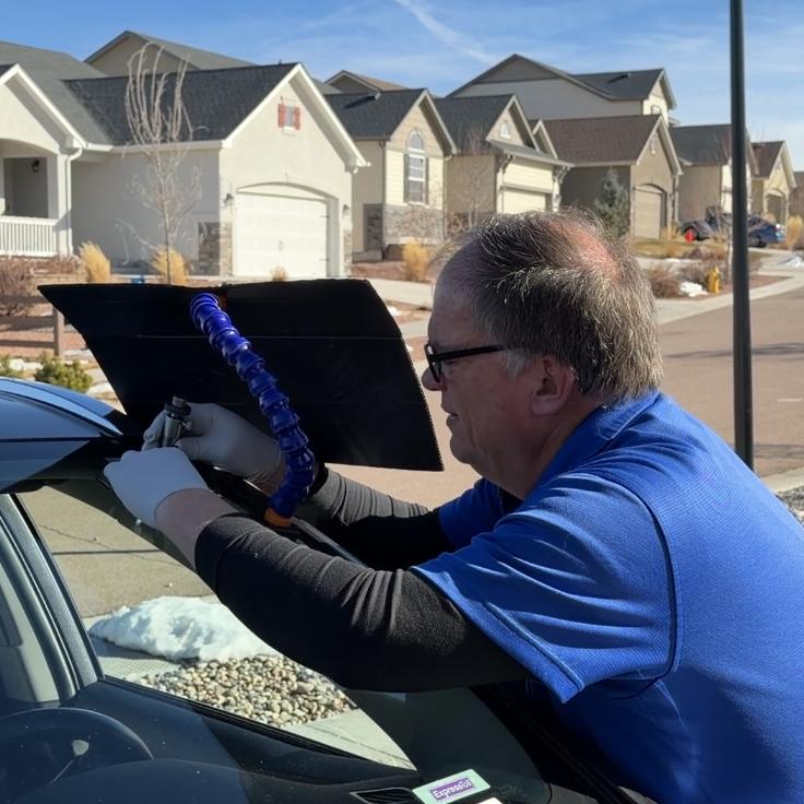 Bob repairing a chip on a Toyota Highlander