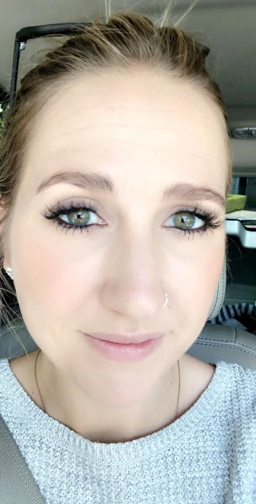 Sam E. showing her lash extensions