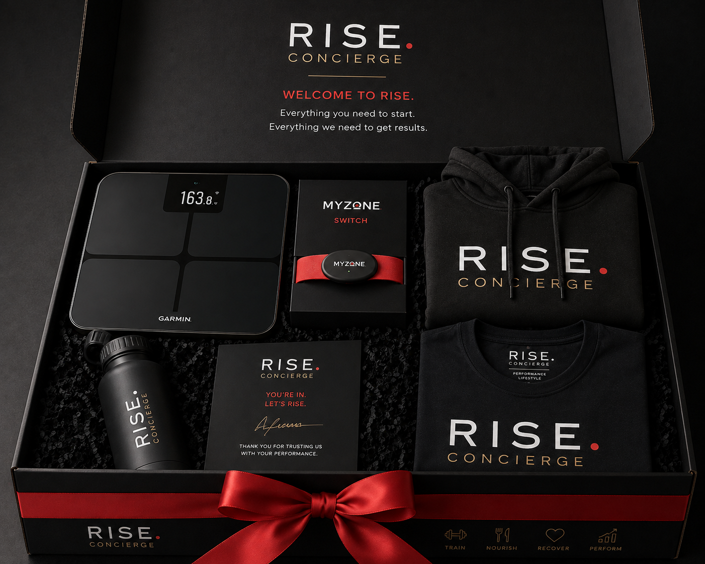 RISE Concierge premium welcome pack including Garmin smart scales, Myzone Switch, RISE hoodie, RISE T-shirt, water bottle and welcome card
