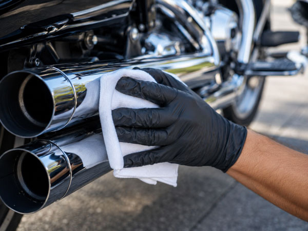 Chrome polishing step of mobile motorcycle detailing in Great Falls VA