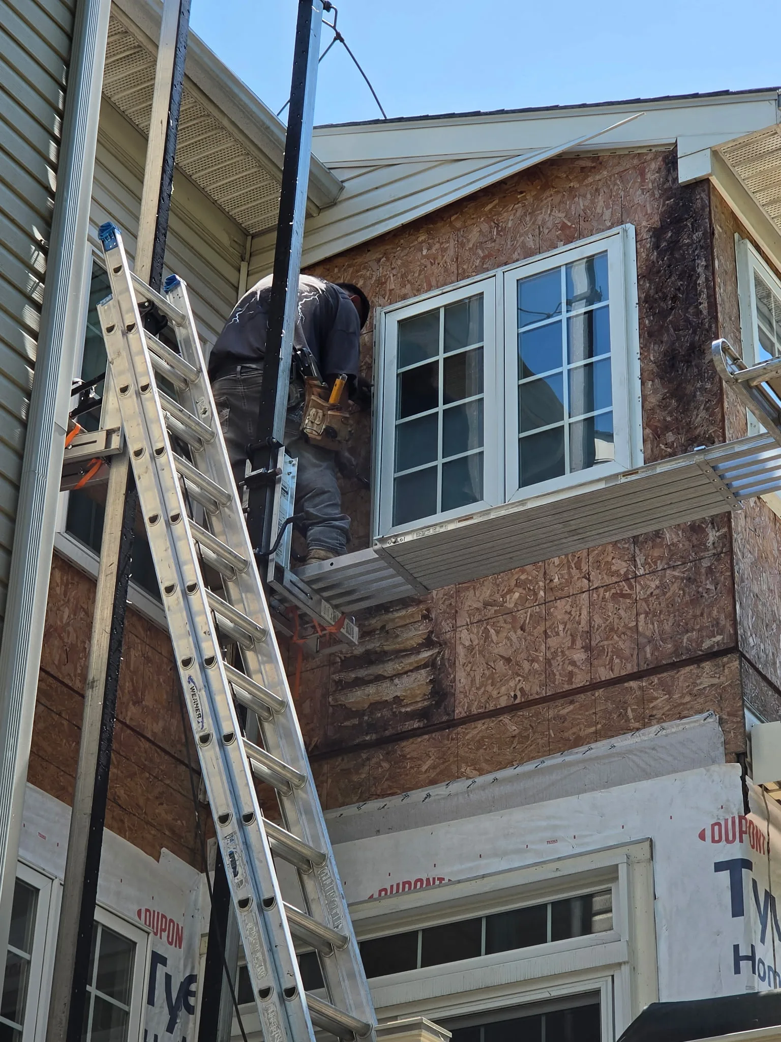 Replacement windows installed on a two-story Maryland home