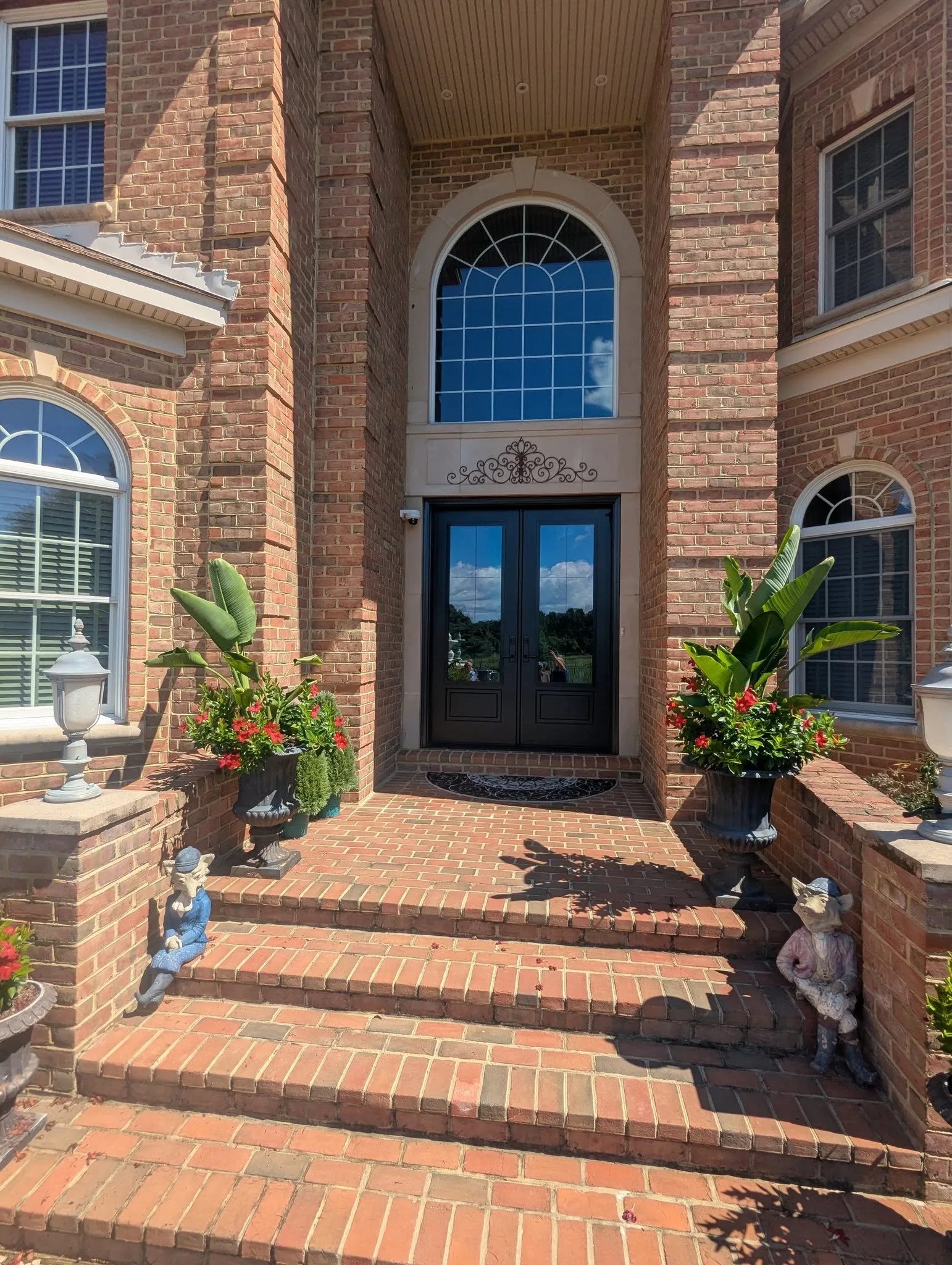 Custom fiberglass entry door with decorative glass sidelights