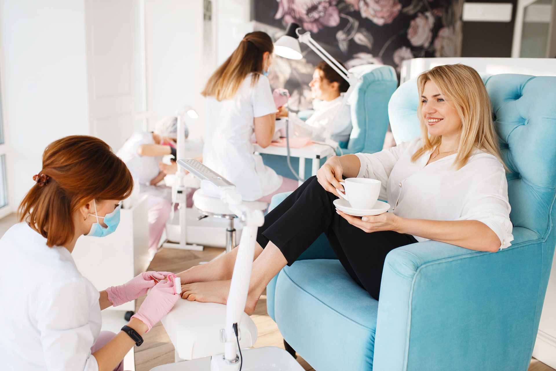 Gel manicure curing under a lamp at Organic Nails & Spa in Fairfax