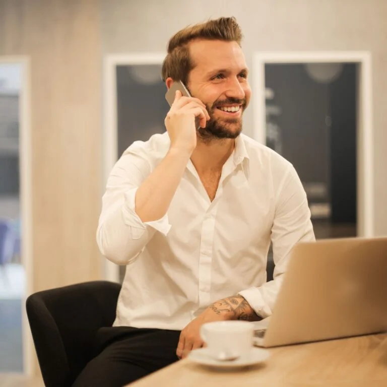 Broker on a call reviewing leads