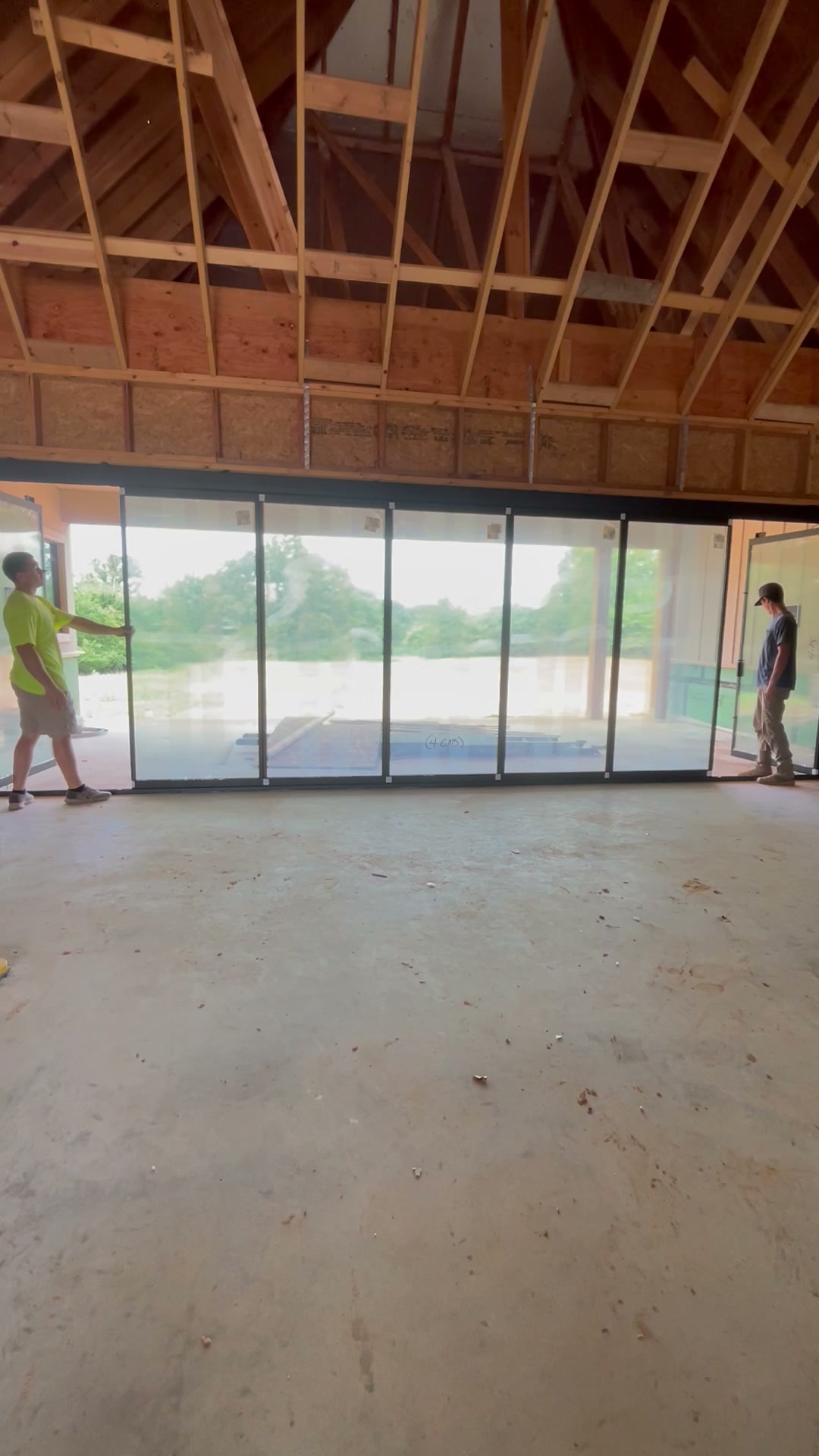 Glass wall overlooking backyard