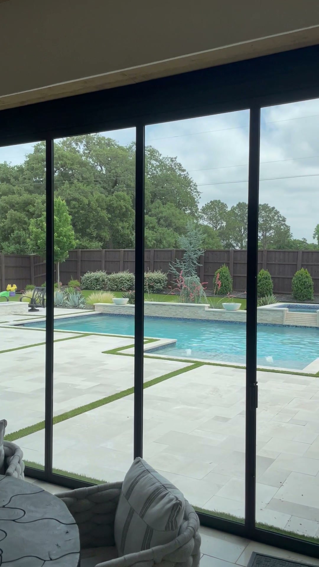 Sliding doors open to pool