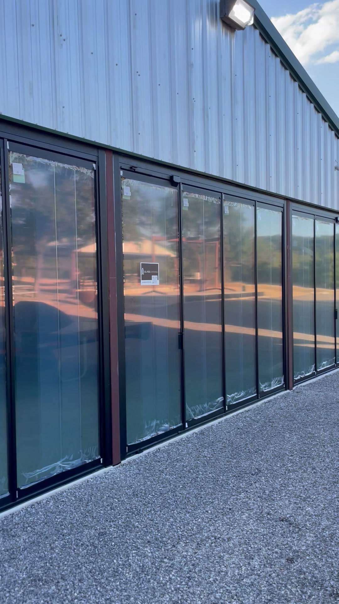 Multi-panel glass doors