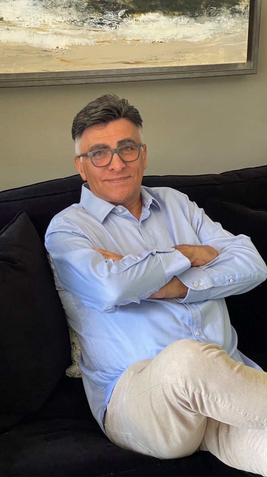 Carl Adamson, founder of Authority Coffee, in his private library