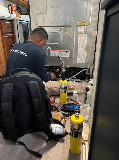 Coast Appliance Repair technician working