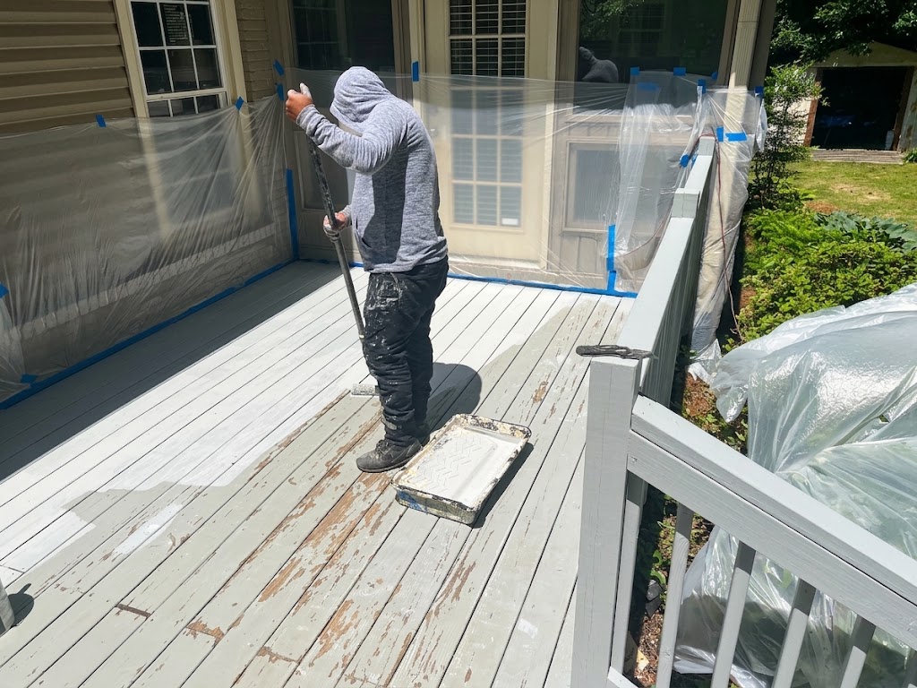 Professional deck painting services for outdoor living spaces