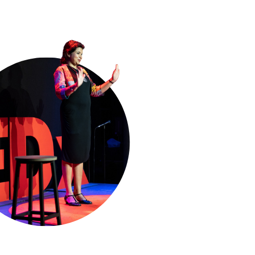 Padmasini speaking on stage