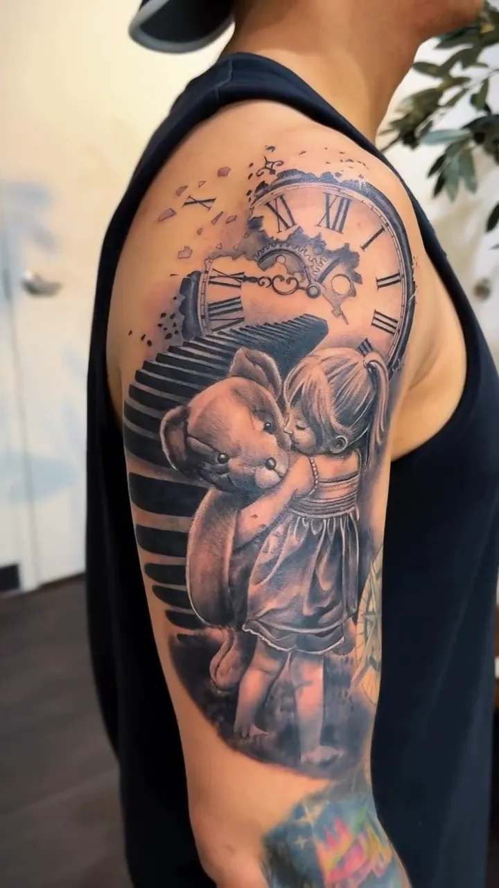 Realism girl clock and teddy bear half sleeve tattoo by Joan Martinez at Studio AZ Minneapolis