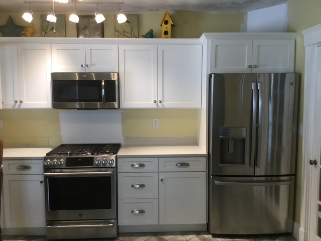 After kitchen with white shaker cabinets