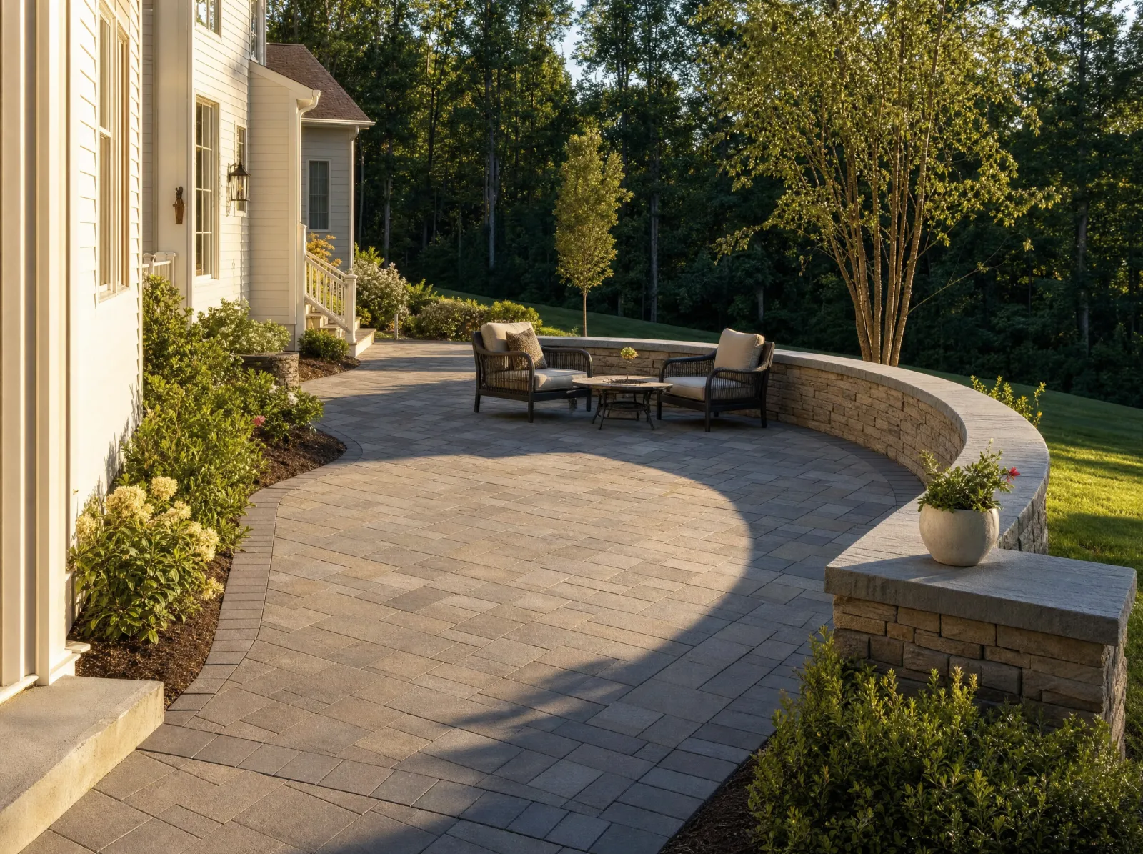 Design concept: Paver patio with fire pit and seat wall, evening.