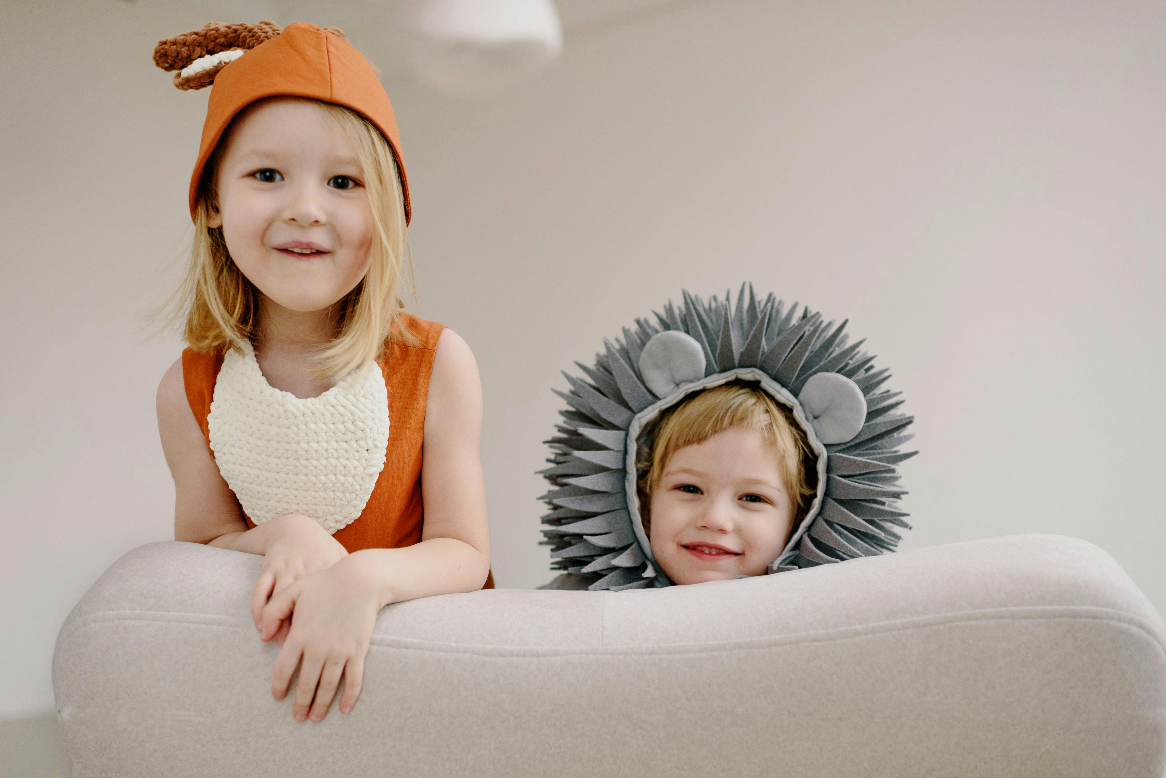 two kids posing for a picture. 