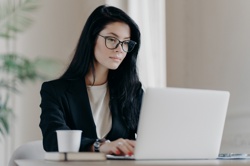woman searching on a laptop