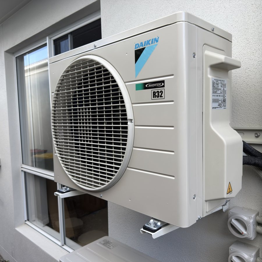 Daikin outdoor unit on a wall bracket, Nirimba