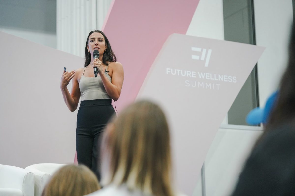 Erika addressing the Future Wellness Summit audience