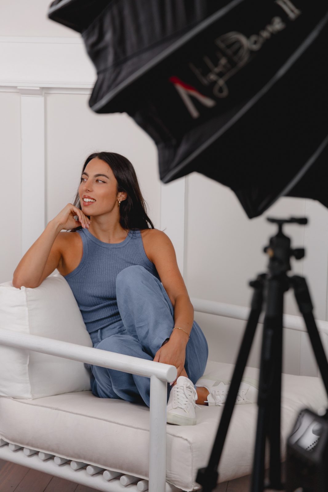 Erika on a sofa during The Balance Theory brand shoot