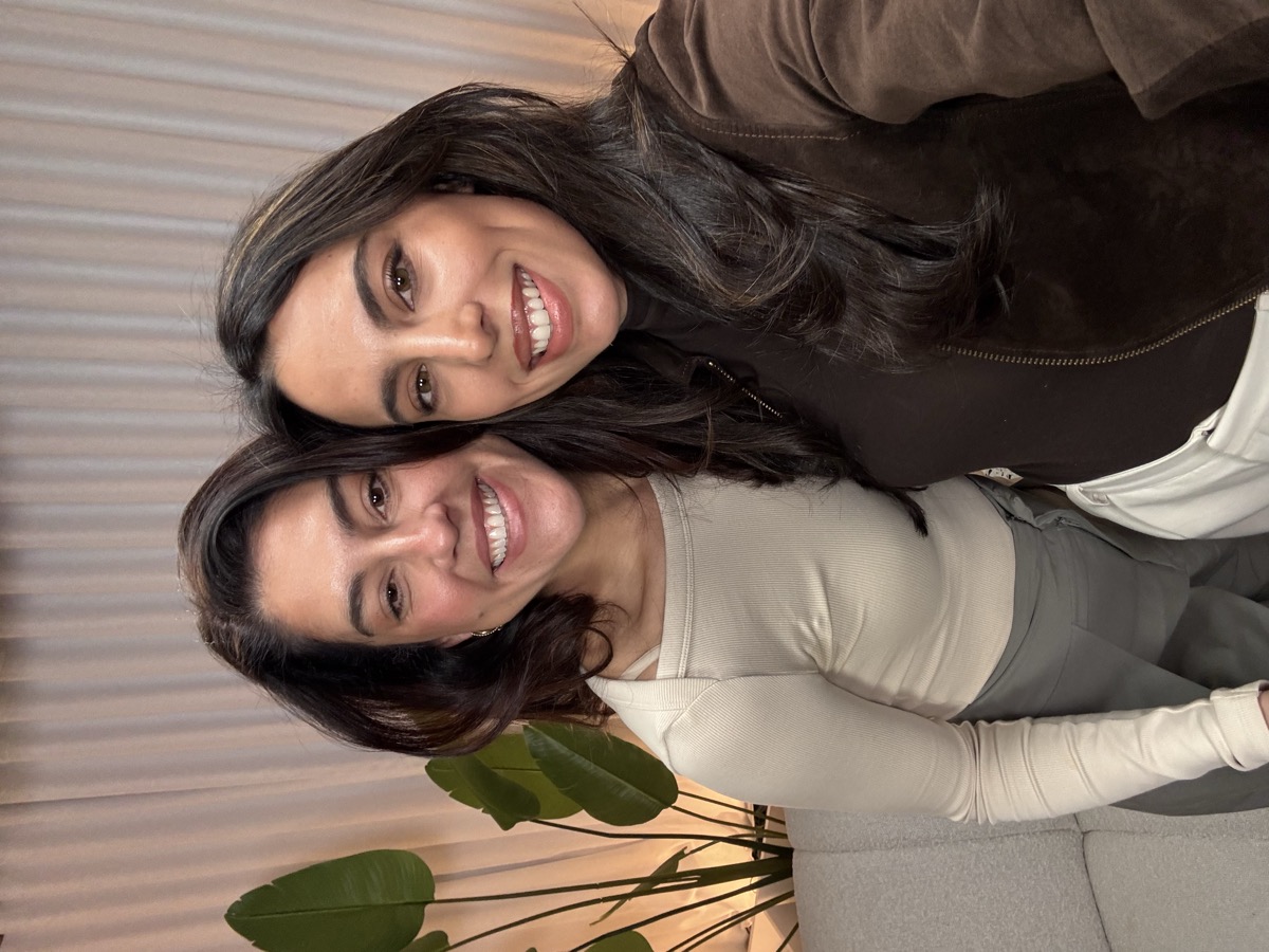 Erika and a guest smiling together after recording
