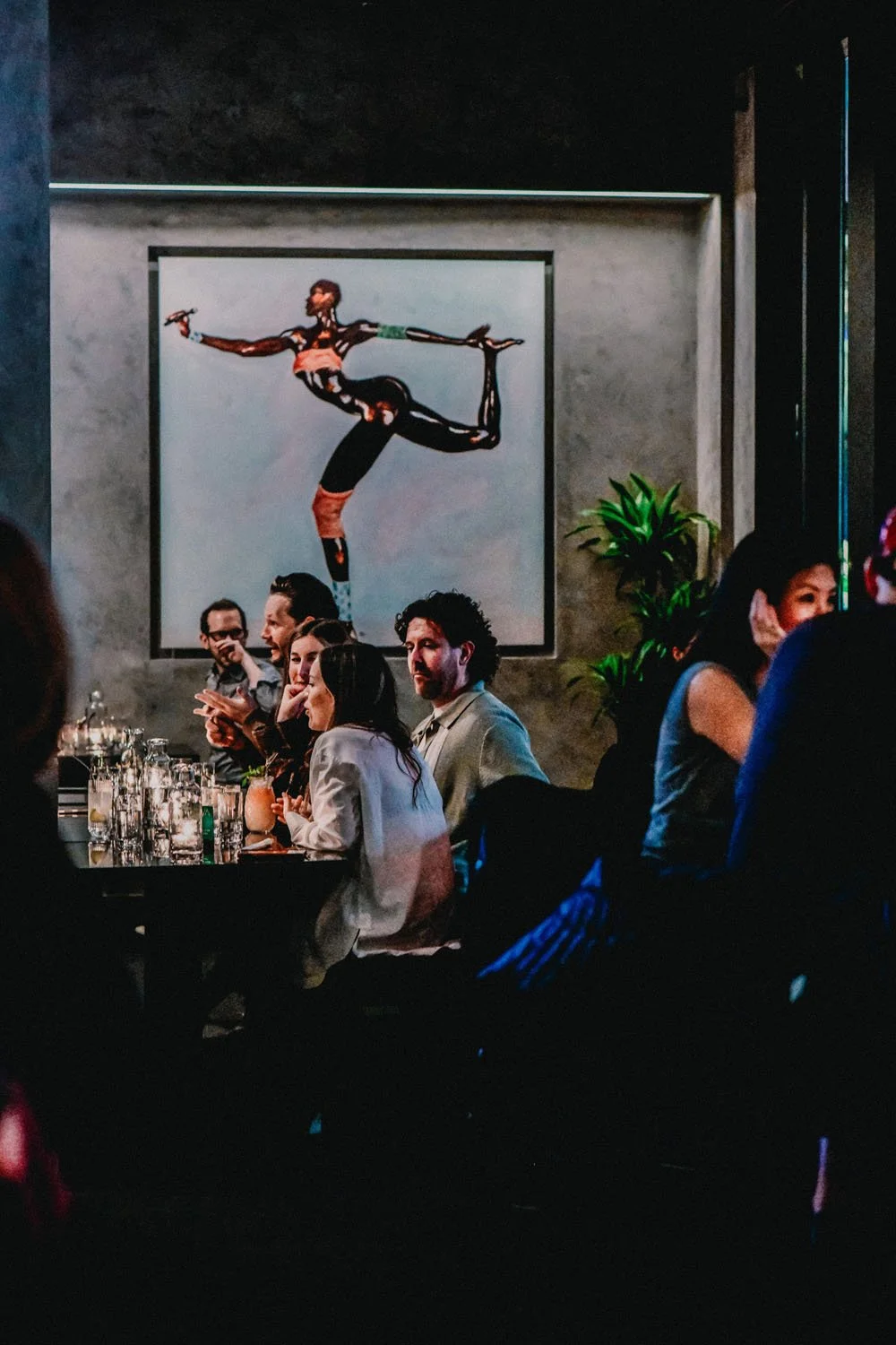 The crowd beneath the art