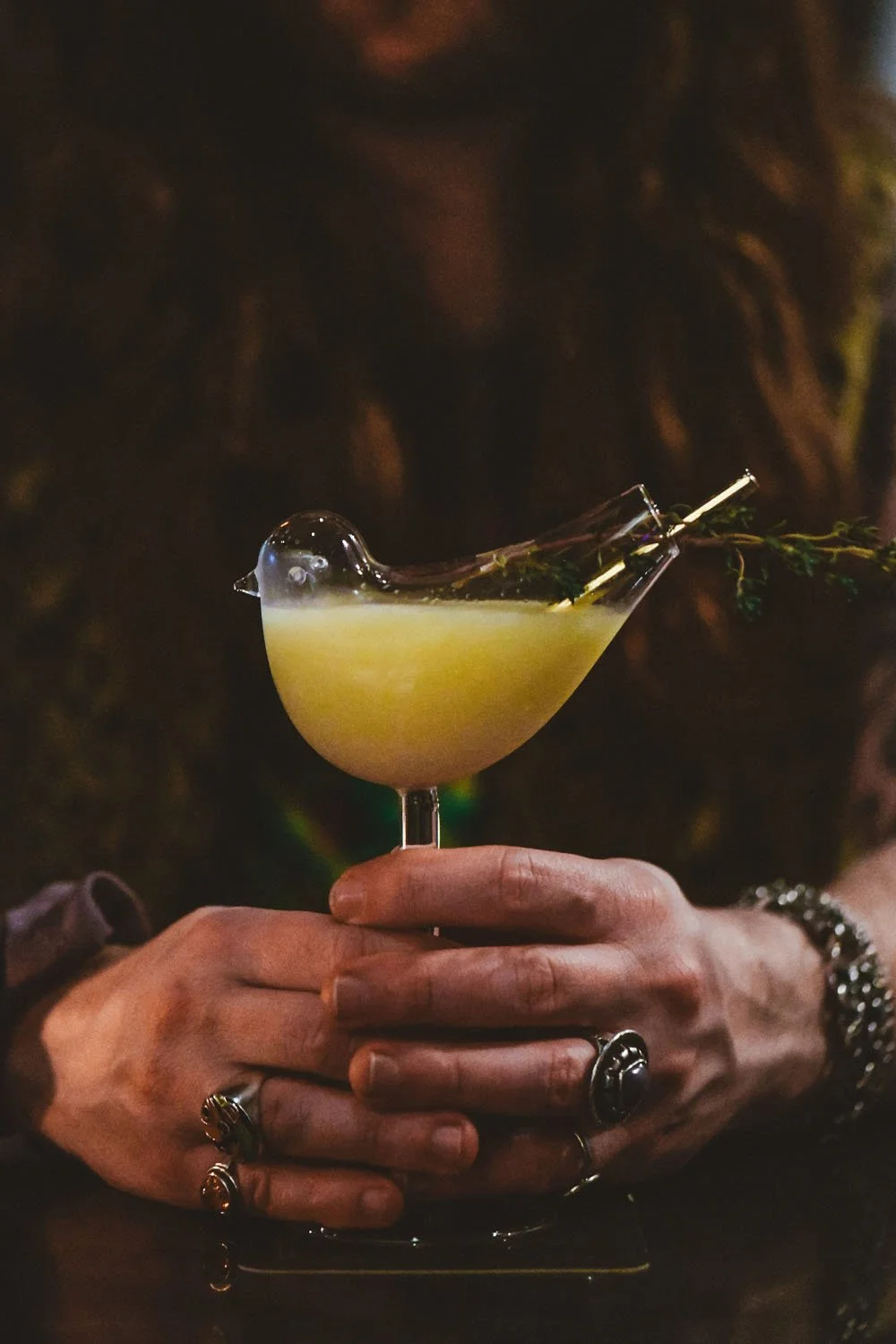 A cocktail in hand