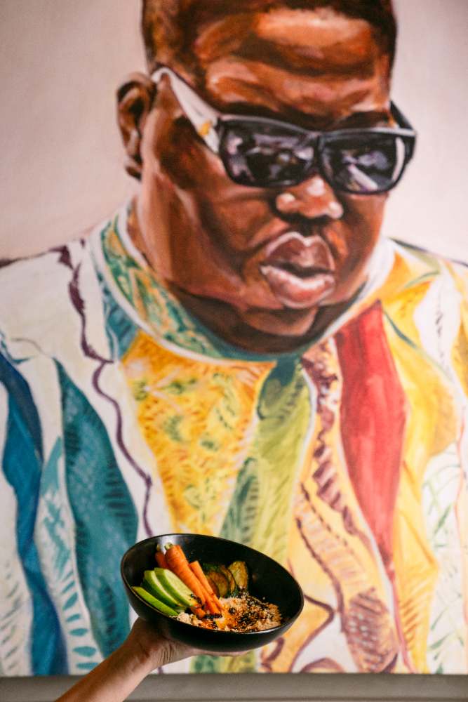 Bites beneath the Biggie portrait