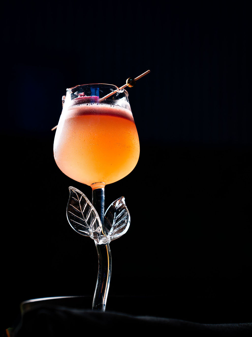The City of Roses in its rose-stem glass