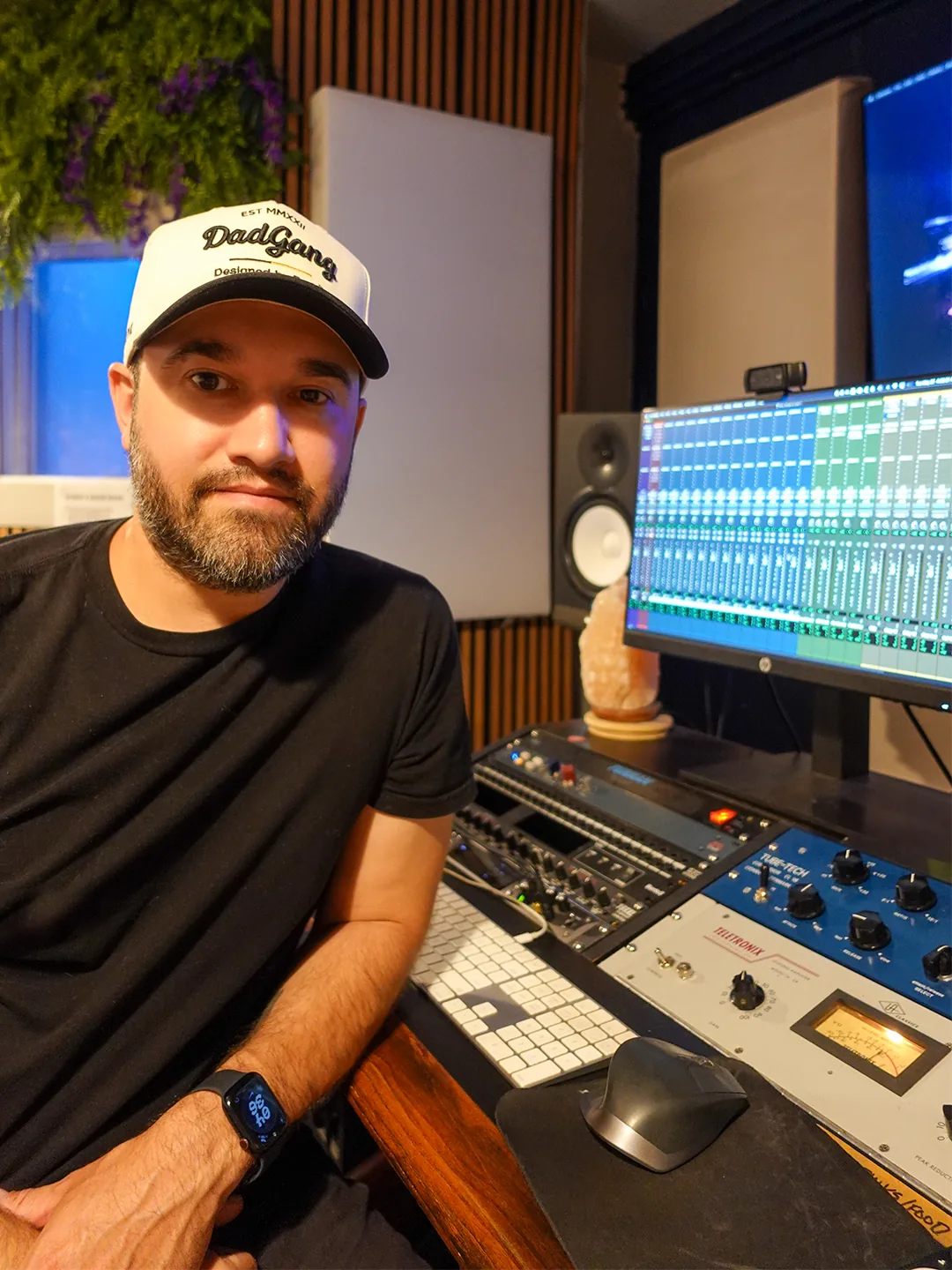 Rob at the console in the studio, outboard gear and a Pro Tools session on screen