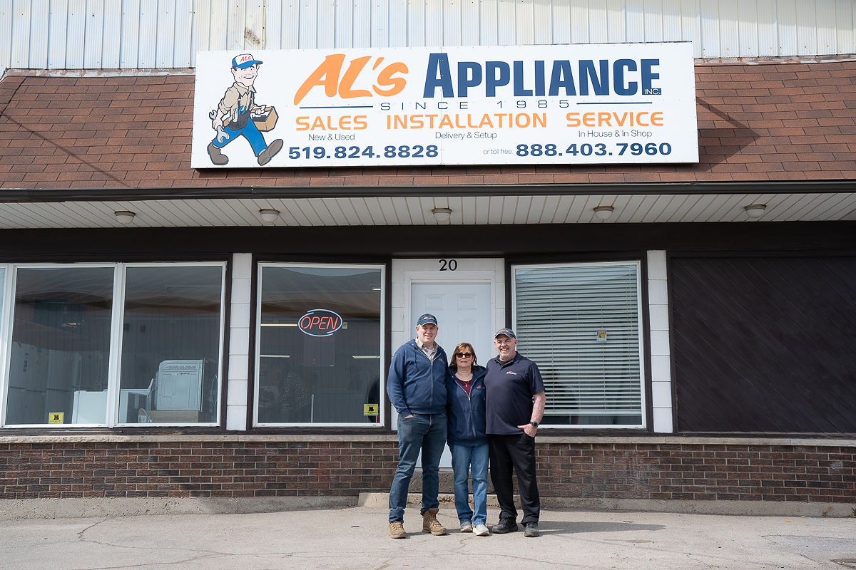The Al's Appliance team outside their local appliance store