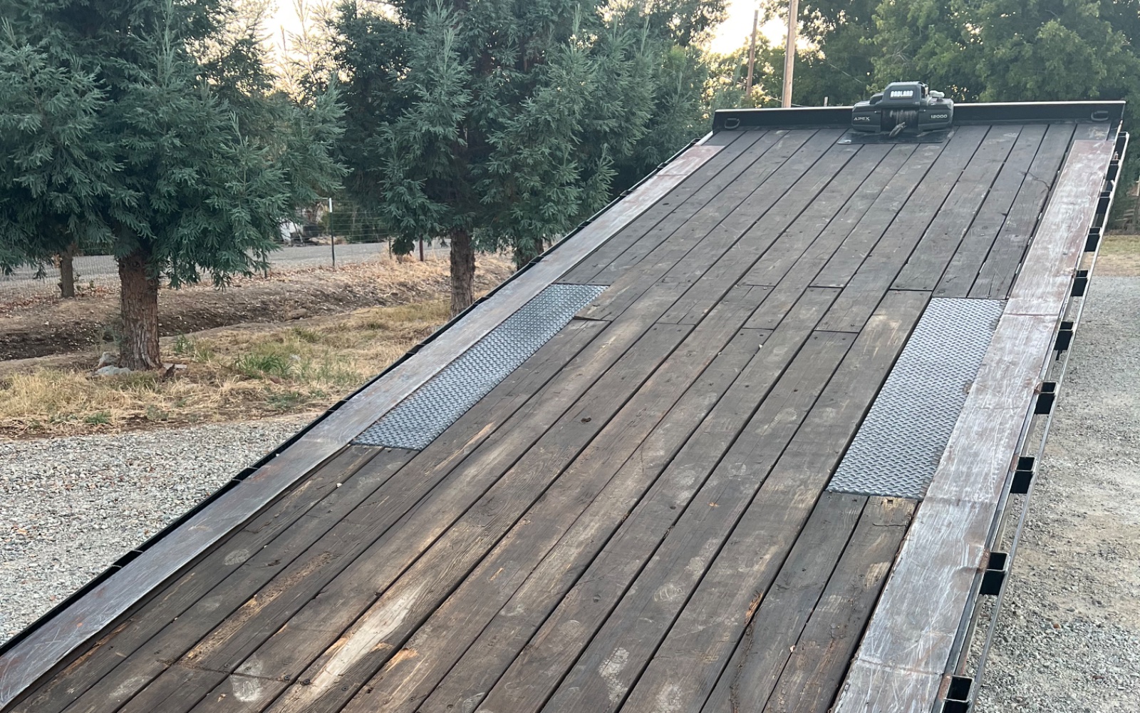 Big Tex 24 foot deck over tilt trailer rental with hydraulic tilt deck and winch at JWC Trailer Rental in Cottonwood, CA