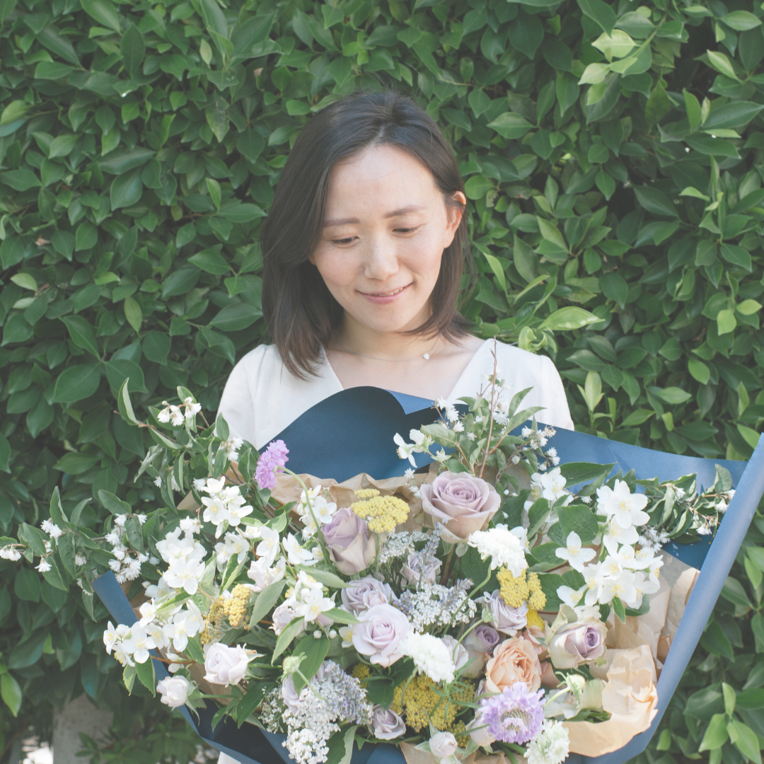 Soyoung with floral arrangement