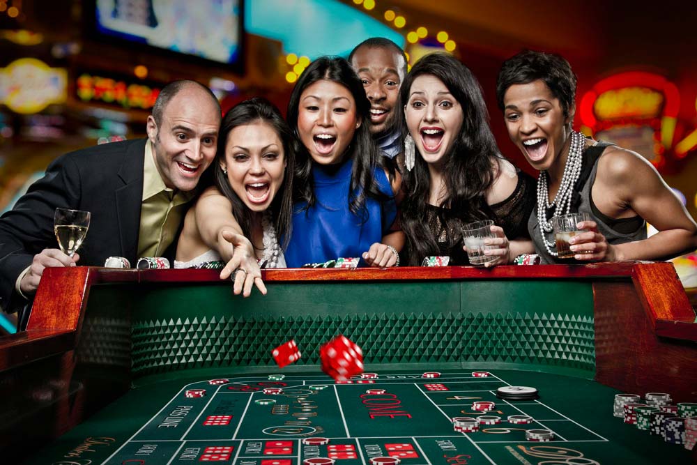 Friends celebrating at a casino table