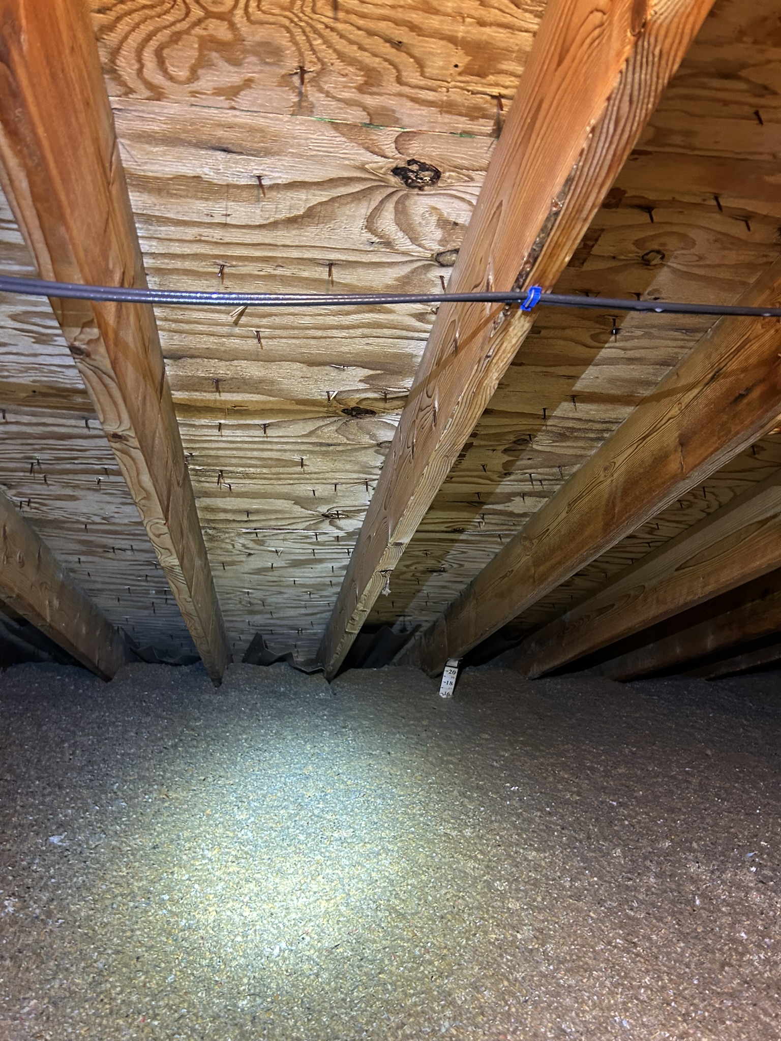Manchester attic after remediation: clean roof sheathing