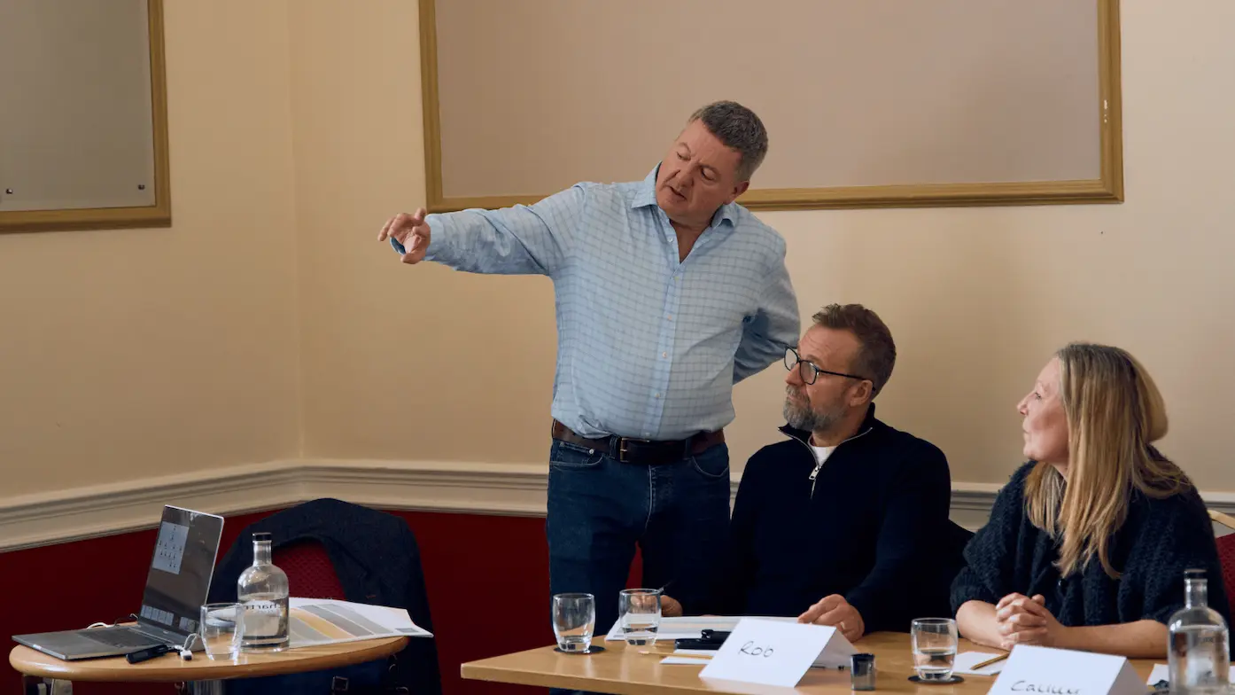 Robin Hayhurst mentoring construction business owners during a workshop