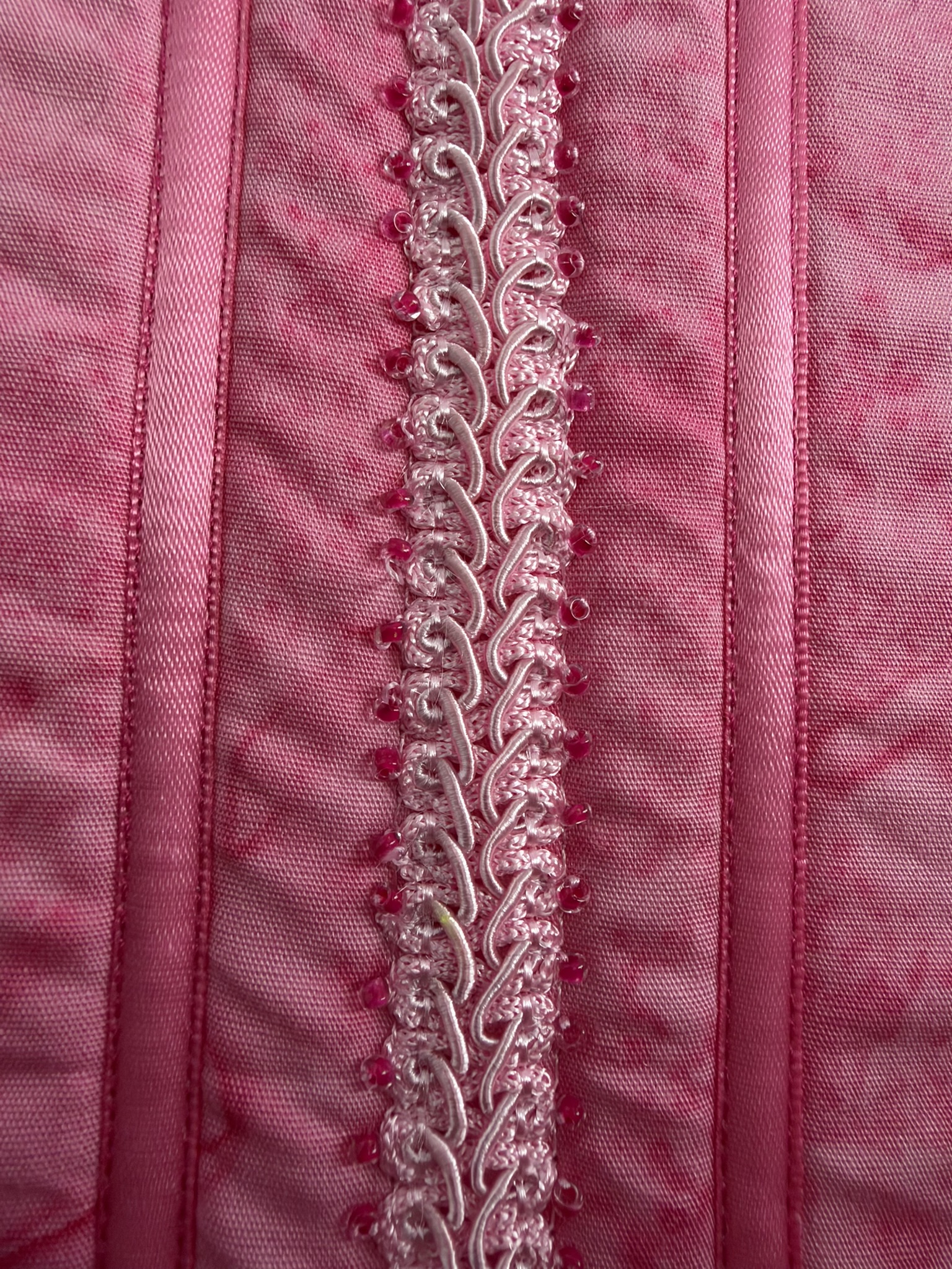 Pale pink gimp edged with tiny pink beads