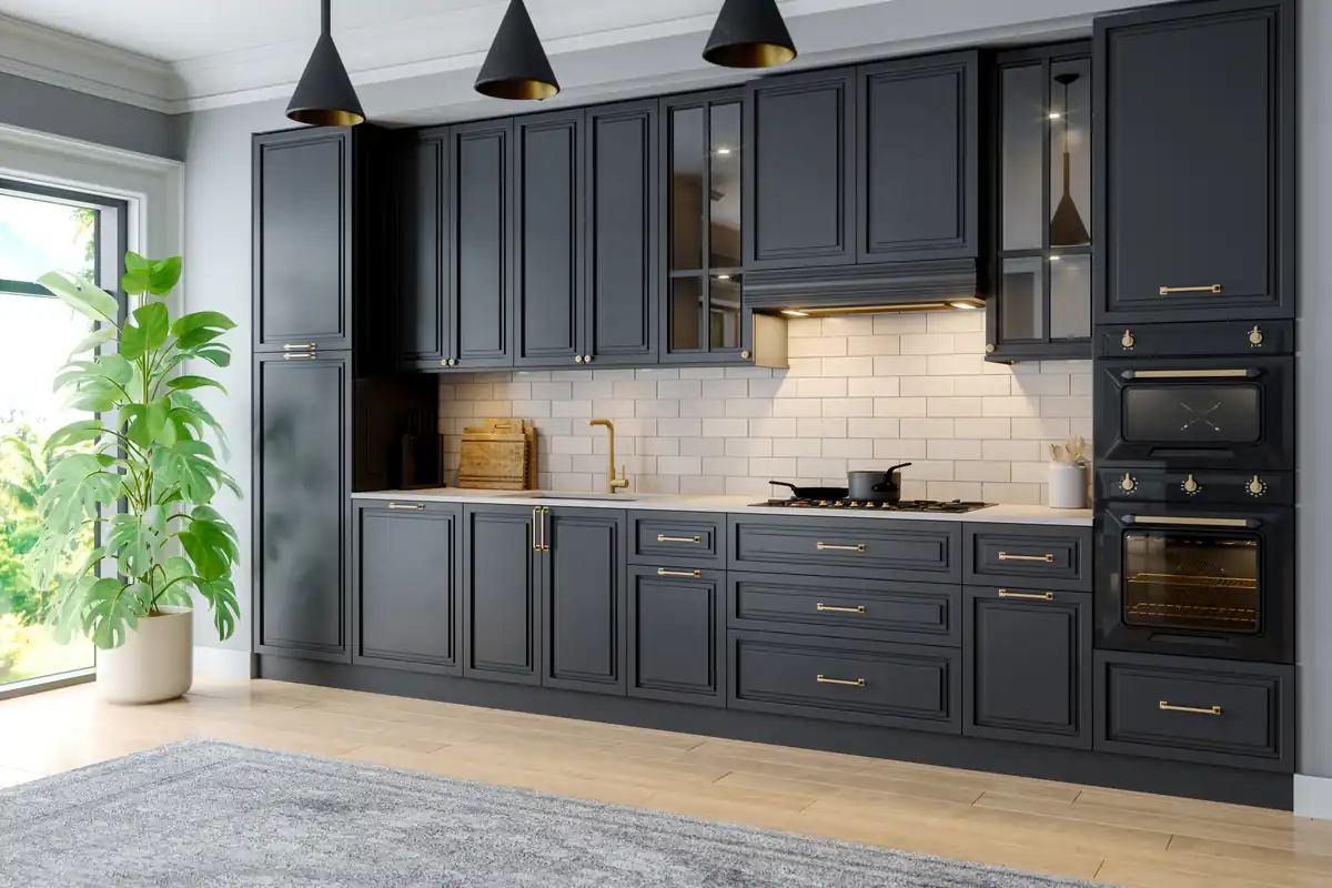 Finished kitchen with dark cabinetry, wood tones and a planted corner